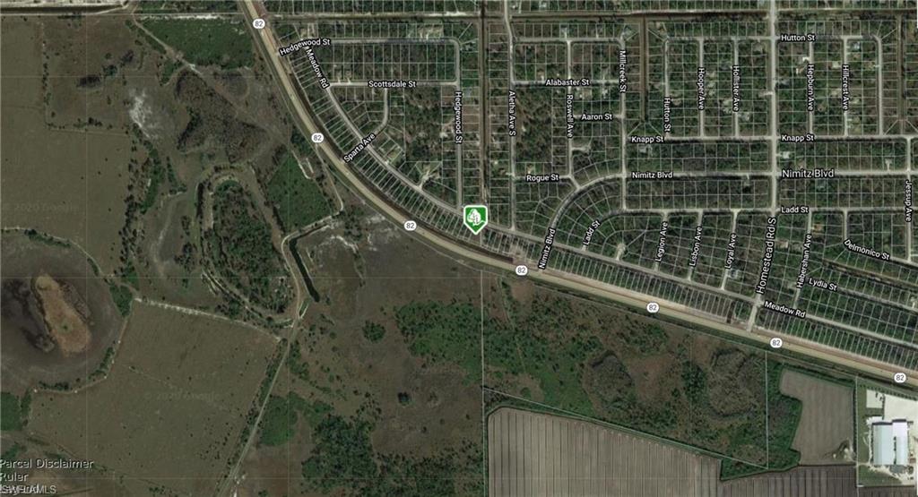 almost .5 acre corner commercial vacant lot on SR 82 Lehigh, major road, many exposures, build your business here, adjacent lot is available, agent has 100+ other commercial lots mostly around SR 82 area for a package deal, as-is