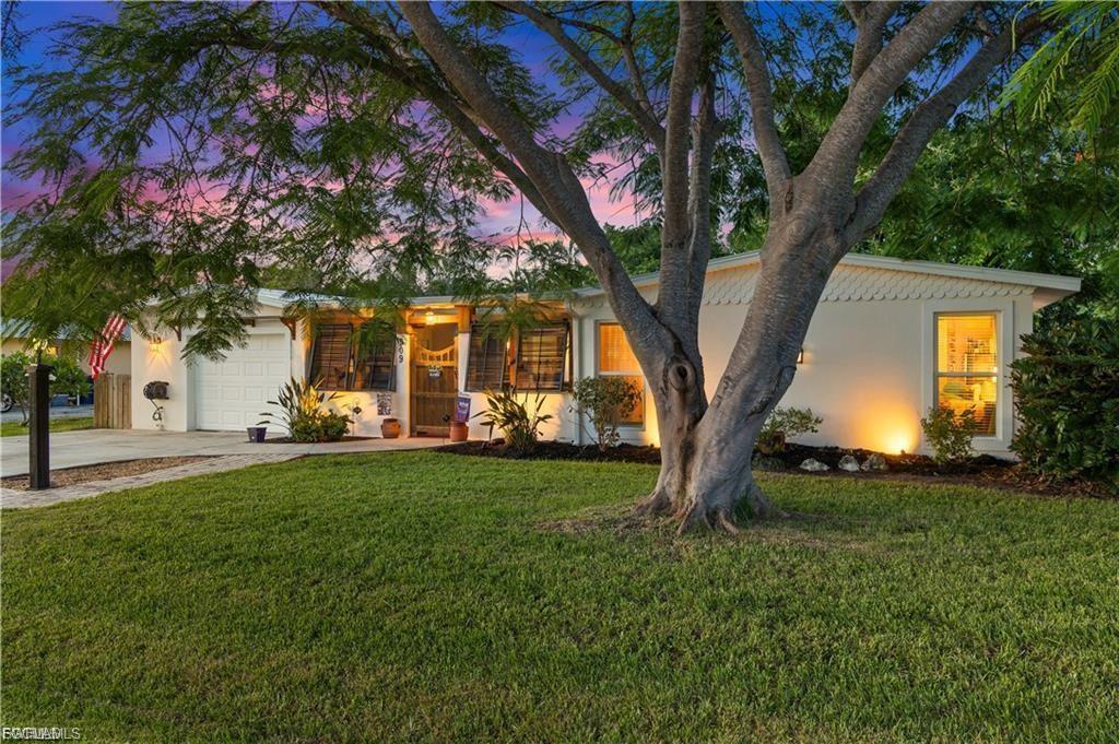 Welcome to 509 Val Mar Drive! | Tucked just off historic McGregor Blvd and steps from the Caloosahatchee River, this one-of-a-kind Mid-Century Modern gem blends timeless style with smart upgrades and cozy charm. From the moment you arrive, you'll notice the attention to detail—from mature landscaping and smart outdoor lighting to a unique open-air front courtyard featuring a 7-person hot tub (negotiable), custom Bahama shutters, and wood columns. Inside, natural light floods through impact-rated dual-pane windows, illuminating open, airy living spaces with crown molding, board and batten walls, shiplap accents, and custom millwork throughout. The heart of the home is a thoughtfully upgraded kitchen featuring custom cabinetry with under-cabinet lighting, a farmhouse sink, new appliances, and built-in storage. An oversized dining area with charming built-ins offers room to host family gatherings or intimate dinners. The living spaces and bedrooms feel bright and breezy, anchored by terrazzo tile floors and complemented by barn doors and stylish ceiling fans. The primary suite boasts a custom walk-through closet, while additional highlights include dual-zone A/C, two hot water heaters (including tankless), a spacious laundry and storage room, and a garage with two industrial overhead fans—perfect for a workshop. Outside, the fully fenced backyard is your personal retreat, complete with a fire pit area with overhead lighting, a covered grilling patio, and a custom 2023-built shed ideal for a man cave, she-shed, or hobby space. Practical upgrades include a new metal roof (2020), a 13,000-watt whole-house generator (negotiable) with RV-style hookup, a smart irrigation system, and a reverse osmosis water treatment system. You'll also enjoy plenty of parking, a separate oversized storage room in the garage, and no HOA or deed restrictions. Set in peaceful Val-Mar Village—loved for its community vibe, walkability to the river, proximity to shopping, and quick access to Downtown Fort Myers, Cape Coral, and the beaches (Fort Myers, Sanibel, Captiva) —this is more than just a home. It’s a lifestyle. Don’t miss your chance to experience this rare blend of character, comfort, and convenience. Schedule your private tour today.