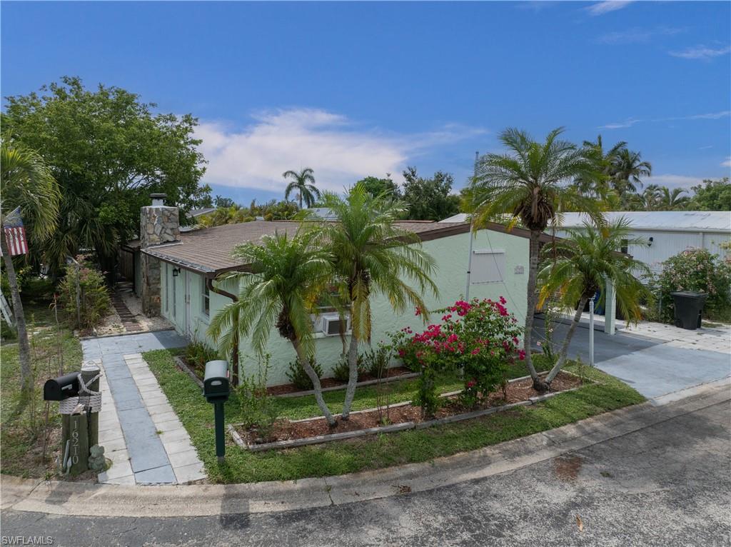 Welcome to this beautifully renovated and fully furnished manufactured home in an unbeatable location, just approximately 5 miles from Fort Myers Beach and close to Sanibel Island shopping, dining, and entertainment. This move-in-ready home offers 3 bedrooms, 2 bathrooms, plus a den, making it ideal for year-round living, seasonal use, or investment.
Inside, you’ll find an open and inviting layout with tile and vinyl plank flooring throughout for easy maintenance. The spacious living area features a cozy fireplace, ceiling fans, and a comfortable flow into the dining and kitchen areas. The updated kitchen is designed for both everyday living and entertaining, offering granite countertops, stainless steel appliances, and plenty of cabinet space.
A stylish stairway leads to the guest bedroom, guest bathroom, and den, creating a unique overlook of the dining area below. Mini-split AC units throughout the home provide added comfort and efficiency. The primary bedroom includes a private ensuite bathroom with both a tub and shower.
Enjoy outdoor living on the private backyard patio, perfect for relaxing or entertaining guests. The home also includes a large storage room with a washer, dryer, water heater, and reverse osmosis water filtration system.
Currently used as a vacation rental, this property offers excellent income potential. Best of all, you own the lot and land with a low monthly HOA fee of only $100.