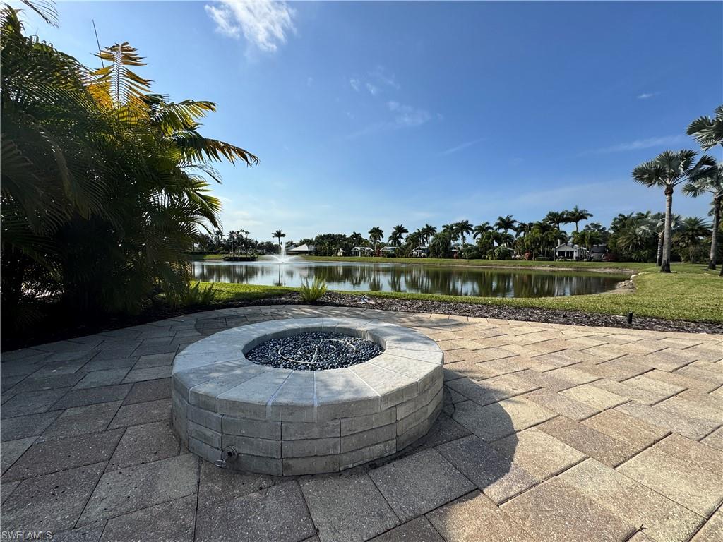Lot 10 is a serene waterfront retreat where Florida’s natural beauty takes center stage. Overlooking two peaceful ponds with a lovely fountain view, this setting invites you to slow down, unwind, and savor the charm of luxury motorcoach living. Sun-filled mornings melt into glowing afternoons, and evenings bring spectacular sunsets and painted skies that shimmer across the water, a daily show you’ll never tire of. Thoughtfully placed pavers create a welcoming outdoor space, including a shaded area perfect for dining, morning coffee, or lingering conversations. The charming coach house offers a cozy escape for reading, relaxing, or hosting overnight guests. Inside, you’ll find a functional kitchenette with sink and mini fridge, a pull-out sofa for guests, and a front-loading washer and dryer. The bathroom features a walk-in shower with built-in shelving, sink, and toilet. Double doors with blinds provide privacy, while the included TV, furnishings, and exterior lighting make this property move-in ready. As the day cools, enjoy the new fire pit, where warm flickers of light and gentle breezes create ambiance beneath skies painted in brilliant gold, pink, and blue. Whether entertaining friends or enjoying a quiet waterfront evening, the setting is pure Florida charm. Lot 10 also offers the potential to expand with a larger coach house and enhanced outdoor living space, allowing you to create a waterfront escape as relaxed or refined as you desire. Experience RiverBend Motorcoach Resort, where tranquil retreat meets vibrant RV community. Mornings are yours, relaxing with coffee by the water, strolling over the walking bridges, or staying active with pickleball or fitness classes. The River Clubhouse (open seasonally) is the hub for connection, hosting live music that may have you dancing in your seat, or on your feet. While themed dinners and taproom trivia spark friendly competition and laughter. Creativity thrives at the Creations Clubhouse, where hands-on classes and shared passions bring neighbors together in a welcoming way. Afternoons are sun-soaked and full of options, cruise the resort by golf cart, relax poolside with a cocktail at the cabana bar, or simply soak up the Florida sunshine. Evenings bring the perfect balance of calm and fun, glowing skies over the river, laughter around the pool, and the fire pit adding warmth and ambiance for unforgettable nights under painted skies. RiverBend isn’t just a place to stay, it’s a lifestyle. A luxury RV motorcoach resort where tranquility and fun coexist beautifully, friendships form naturally, and every visit leaves you planning the next. One stop here, and you’ll see why one visit is never quite enough.