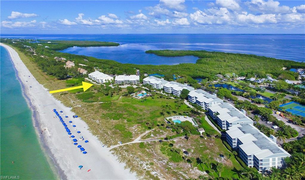 Fabulous income from this sublime condo in premier spot in South Seas Resort at the northern tip of Captiva Island. The serene low density 2000 building is north of the larger Beach Villas area with a separate entrance, secluded swimming pool and gorgeous views over   the Gulf of Mexico.  Spacious and airy,  with high ceilings and large sliding glass windows leading to a lanai overlooking the beach, the apartment  has been updated with plantation shutters, ceiling fans and impact windows.  There is storage under the building and a washer and dryer for the convenience of owners.   Totally refurnished in 2017, this beautiful apartment grossed more than 107,000 in gross annual income in 2018.