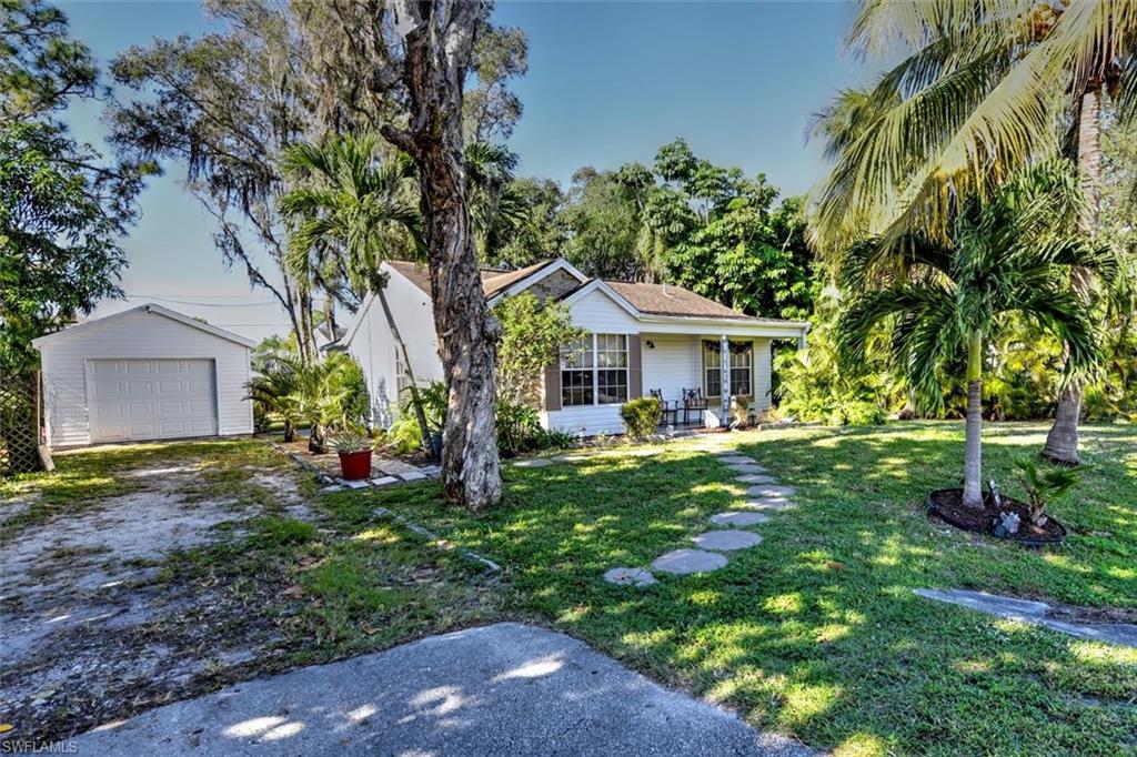 Adorable 2 Bedroom Home in the heart of San Carlos Park.  No HOA fees or restrictions. This home has been almost completely renovated including new vinyl siding on the exterior with new pressure treated wood underneath, new front door, new slider in the master bedroom, new water system, all new flooring, new countertops, deep stainless sink and stainless steel appliances in the kitchen, all new light fixtures, and new tub and toilet in the bathroom. The home is situated on a large private lot with mature trees and features a screened lanai, a large pergola deck off of the master bedroom, and a side deck.  San Carlos Park is located in south Ft. Myers, just minutes from Bonita Beach, the airport, Coconut Pointe Mall and pretty much anything else you need!  This home is perfect for a single person or a retired couple.  It would also make a great Airbnb.