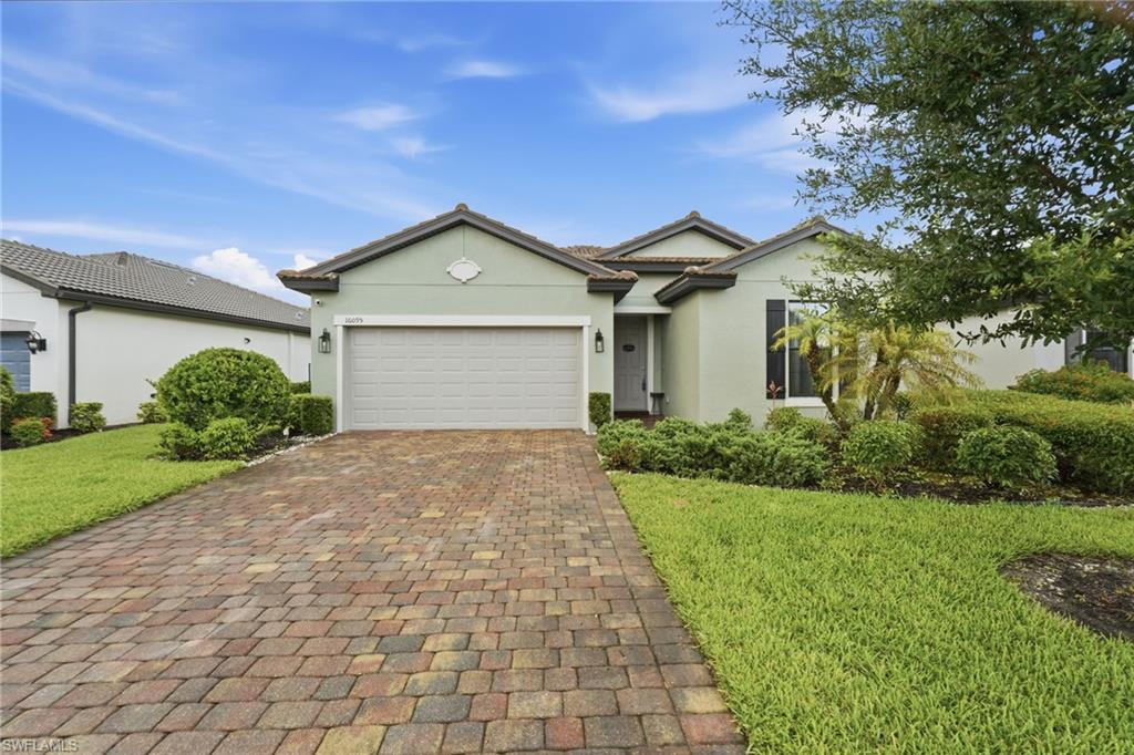Welcome home to a beautifully updated, smart-home compatible retreat where comfort, style, and Florida living come together. Start your mornings with a cup of coffee while taking in peaceful lake views from your backyard as your favorite four-legged companion enjoys the fully fenced yard. Step through the sliding glass doors and into a thoughtfully renovated interior featuring a stunning kitchen, oversized pantry and entry doors, and unique design elements that create visual interest around every corner. From the inviting living spaces to the intentionally designed bedrooms, every detail has been curated to create a home that feels both comfortable and inspiring.

Located within the highly sought-after River Hall Country Club, residents enjoy access to an exceptional 1,500-acre master-planned community where more than half of the acreage is dedicated to lakes, preserves, and green spaces. Amenities include a 24-hour gated entrance, a 14,000-square-foot Town Hall Amenity Center, state-of-the-art fitness center, aerobic classes, treatment rooms, game room, snack bar, and a full calendar of community activities. The clubhouse features a resort-style pool, workout room, and tennis courts, while outdoor enthusiasts will also enjoy pickleball courts, bocce ball courts, a playground, and a multi-purpose athletic field.

Conveniently located near downtown Fort Myers and within easy reach of Naples, residents enjoy quick access to Southwest Florida's world-class beaches, boating, dining, shopping, entertainment, and cultural attractions. This is more than a home—it's a lifestyle designed for those who want to enjoy the very best of Florida living.