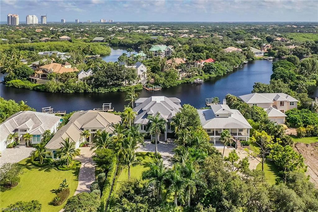 Be amazed at this spectacular riverfront home that has been completely rebuilt from the studs up to incorporate every possible luxury. Eighty feet on the Imperial River allows for incredible views. Indulge with whatever water toys you may fancy with two boat docks and lifts. Just a short way to the Gulf of Mexico and a mile and a half from Bonita and Barefoot Beaches in a fenced-in property, this six-bedroom, seven-and-a-half-bath, four-car garage home is a one-of-a-kind. The fully finished ground floor allows for hobby and exercise areas. The gourmet kitchen with two large islands and upgraded Thermador appliances includes everything you might need to entertain. Some special features are a private elevator, master bath with a steam shower, a laundry room on each floor, a whole-house generator, tankless water heaters and the list goes on and on. Minutes away from the best shopping and dining, come live your best life in Florida.