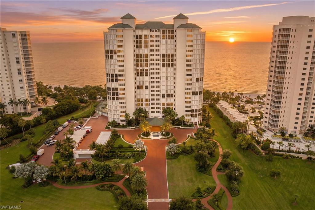 Experience luxury beachfront living in this beautifully renovated and professionally decorated residence in The Carlysle at Bay Colony. Offering breathtaking Gulf views, this exceptional 3-bedroom plus den condo features 3 ensuite bathrooms, a powder bath, and every detail thoughtfully designed for effortless turnkey living. 

The spacious open-concept floor plan is highlighted by a stunning gourmet kitchen with Sub-Zero refrigerator, wine fridge, abundant custom cabinetry, and seamless flow into the living and dining areas. All perfectly positioned to capture the spectacular Gulf backdrop. The den features a custom built-in, ideal for a home office or additional lounge space.

The luxurious primary suite is truly incredible with an oversized room, gorgeous view and separate his-and-her bathrooms, each featuring its own vanity, shower, and toilet for ultimate comfort and privacy.

Additional features include impact-resistant windows with electric shades, electric hurricane shutters on the lanais, and the rare convenience of 3 assigned garage parking spaces, including one on the main lobby level.

Residents enjoy a newly renovated pool and direct beach access, creating the ultimate coastal retreat in one of Naples’ most prestigious communities.