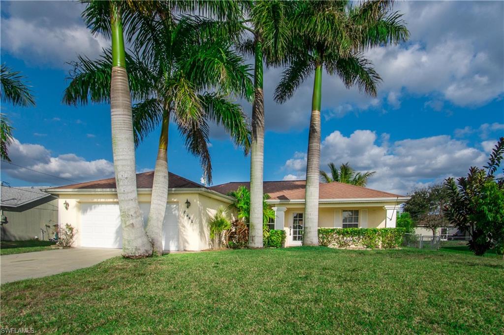 Great 3 bed/2 bath pool home! This house has a beautiful outdoor pool area along with pavers and lots of privacy trees, banana trees, mulberry trees, peach trees, coconut trees, plum trees, & lemon trees. Tile and laminate floors are elegantly laid throughout this home. Impact windows offer extra storm protection. Great open floor plan with cathedral ceilings are perfect for entertaining or just enjoying your family. Will not last long at this price.