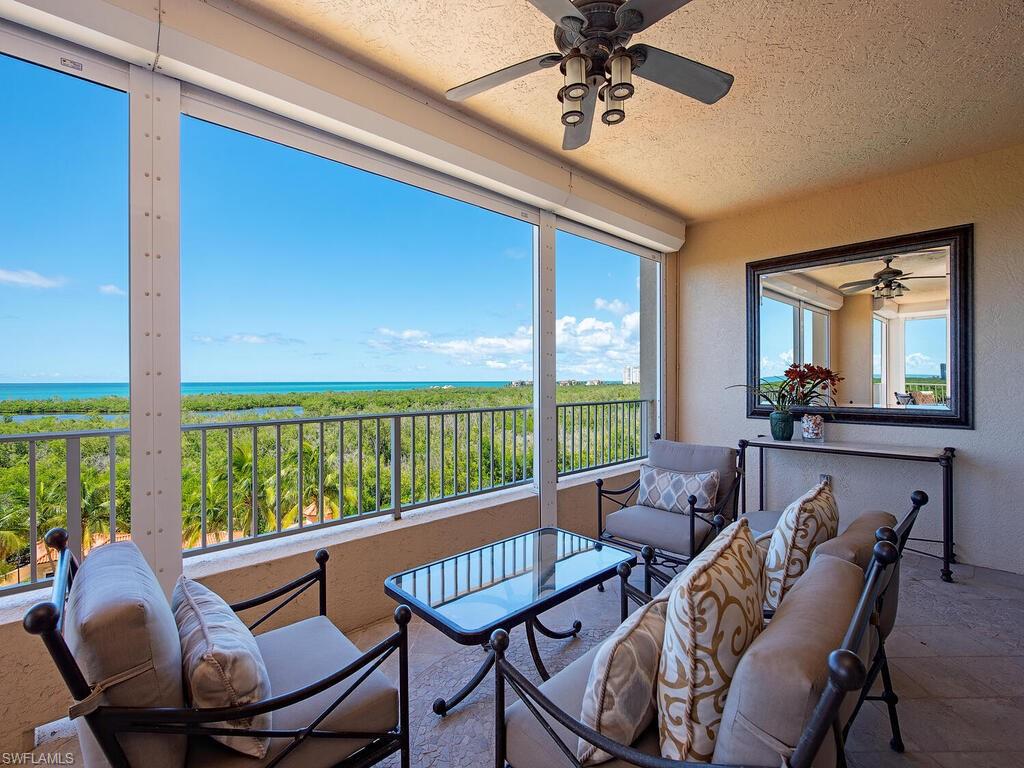 Behind the gates of Crown Colony sits the elegant Cap Ferrat. Experience the allure of this gracious residence and rarely available Pelican Bay 4 BR, 4 BATH + FAMILY ROOM + POOLSIDE CABANA. With 3,650 sq ft under air, this gem has uninterrupted VIEWS of the GULF and is anchored by the verdant tropical mangrove and palm canopy vistas.  A secure elevator sweeps you directly to your own private foyer welcoming you to a bright and generous living room. Designed to maximize and blend living/entertaining spaces with timeless sophistication, the home also features expansive Easterly and Westerly lanais and terraces inviting you to savor tropical Florida Gulf breezes, sunsets, sunrises, and serenity.  The well-equipped Chef's kitchen features handsome custom cabinetry, updated SS appliances, NATURAL GAS cooktop, along with two Sub-Zero beverage drawers AND a charming sun-lit morning room. Separate and spacious family and dining rooms easily accommodate large family or friend gatherings.  Four split bedrooms invite maximum privacy.  The owner’s suite is bathed in SUNLIGHT and GULF VIEWS and has both his and her separate baths and separate walk-in closets.   This extraordinary residence also includes your own deeded, personal poolside CABANA with a gathering room, full bath, and private patio complete with gas BBQ grill and is located just steps from the stunning, expansive resort-style saltwater pool and spa. Cap Ferrat is well recognized for its significant and luxurious tower amenities. Owners enjoy the 24/7 guard-gated entrance, 24/7 front-desk personnel, multiple grand social gathering areas, expansive fitness, personal men’s and women’s spa therapy rooms, along with two beautifully appointed guest suites. The under-tower garage offers owners two deeded side-by-side parking spaces, along with a community electric charging station.  This tower is also prized for being just steps away from the Pelican Bay beach tram station allowing one to easily access Pelican Bay’s myriad of private membership-included community and beachfront amenities: 2 private beachfront restaurants, attended beachfront services, attended fitness, learning center, 18 Har-Tru® tennis courts, sailing, pickleball park now in progress, plus miles of kayaking, biking, and walking paths.     Ask about the never-ending Pelican Bay active social calendar, too! Artis Naples Performing Arts Center, upscale Waterside Shops, lively Mercato, and The Naples beachfront Ritz-Carlton Hotel all just moments away.      This is your opportunity to live where refined elegance meets an exceptional lifestyle!