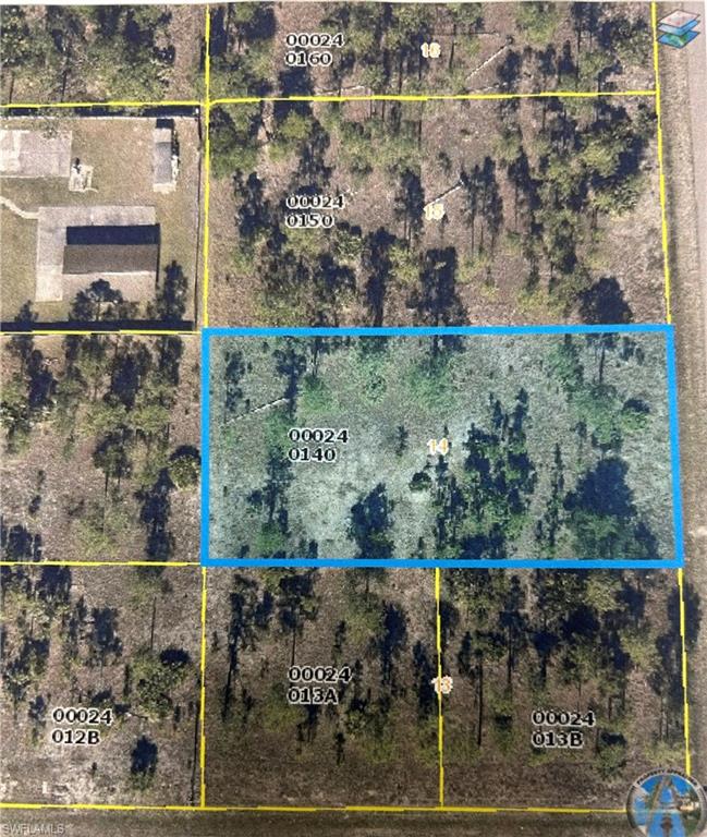 This lush nearly 1/2 acre vacant lot in a desirable neighborhood of Lehigh Acres is ready for you.  Whether you are looking to build your dream home or invest for future projects this lot offers endless posibilities.