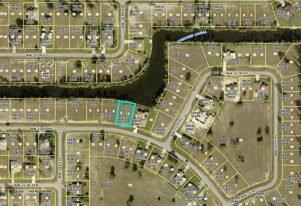 Build your dream home on this cleared lot with a view of Luecker canal on a big beautiful basin with intersecting canals. This canal leads out to Gator Slough. Live the Florida lifestyle with water view-this is why you moved to Florida! New homes being built all around.