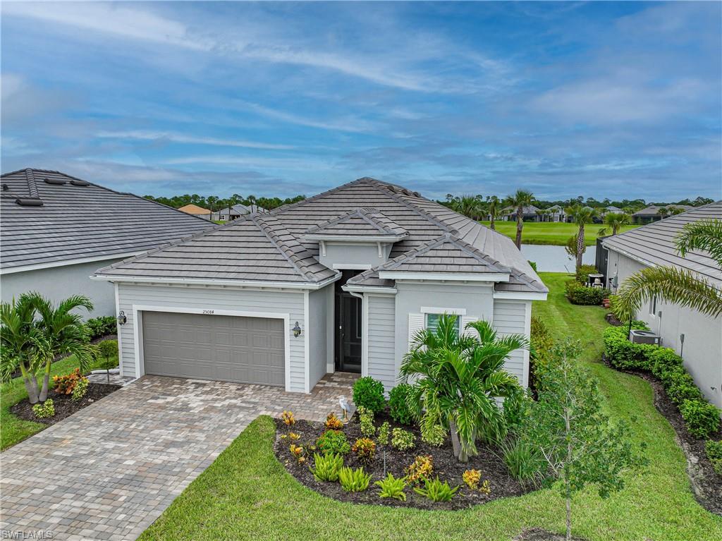 I survived Hurricane Ian! Upgrades galore is what best describes this Maria floor plan home with bundled golf. New Front door with beveled glass. The Office has been reconfigured with Frosted glass French doors instead of pocket doors. Lighted Ceiling fan in every room, Porcelain tile floors throughout and every widow has Plantation Shutters. The kitchen counters upgraded to Quartz, the Sink is now a single bowl with an upgraded garbage disposal, all the Hardware has been changed and the Island has shiplap and has been painted a navy blue. The refrigerator, Washer and Dryer have been upgraded. The secondary baths both have frameless shower doors. The heated pool and spa have been converted to Saltwater with phone automation. Storm Smart hurricane protection for the covered lanai area. This executive home with awesome views also has the advantage of being on a 50-foot manor home lot. There is a whole home and pool equipment surge protection system. So many details you’ll have to see for yourself. The community features golf, tennis, pickleball, bocce ball, a fitness center with spa and three pools to give you a resort lifestyle. Make sure to check out the video.