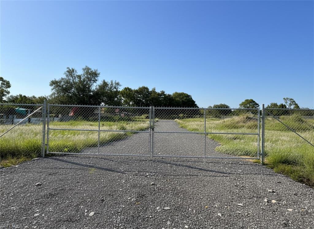 1.25 Acres • Cleared • Fenced  • Ready to Build
If you’ve been waiting for land that’s actually usable from day one, this is it: 1.25 acres in the Montura Ranch Estates area of Clewiston—set on a dead-end road at the very end of the street, with the culvert already done.
This property is clean/cleared, fully fenced, and includes two gates—perfect for bringing in equipment, trailers, or setting up your layout exactly how you want.
Build now, place a home now, or hold as a smart Florida land investment.
Lifestyle Potential: Homestead-Friendly
This is the kind of land buyers love for a simple, self-sufficient lifestyle:
• Space to grow your own vegetables, fruit trees, and plants
• Room for farm animals 
• Plenty of open area for a garden, storage, and outdoor projects

Montura is known for its wide-open space, privacy, and freedom—a rural community where buyers come for:
• Room to breathe and enjoy a quieter lifestyle
• No HOA fees 
• A community atmosphere with clubhouse + swimming pool 
• A private hunting preserve for Montura land owners (Walk and horse permitted access for now)
It’s a great fit for anyone who wants land with flexibility—weekend getaway, homestead, or long-term hold.