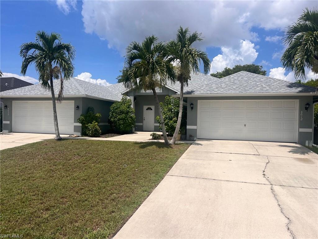 Fantastic 3 bedroom 2 bath 2 car garage duplex in the SW Cape.  This larger duplex is almost 1400sf of living area, huge kitchen, large living room, spacious bedrooms, screened lanai and private backyard, lush landscaping and so much more.  Great SW location close to restaurants, schools and shopping.