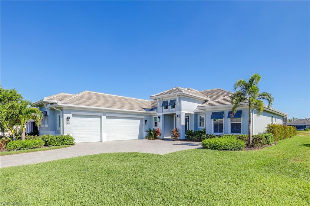 This masterfully constructed former Stock Wisteria model, turnkey furnished, is guaranteed to be a showstopper. Highly desired Naples Reserve is Florida living at its finest. Exquisite coastal design, this residence features an open concept with four bedrooms and three baths. Sleek details to include a full outdoor kitchen with granite countertops, custom design backsplash, stainless steel grill and lovely waterfall and saltwater pool and spa with sundeck. Additional features include an elegantly designed kitchen with Wolf appliances, convection wall oven, under-counter lights, quartz countertops, oversized deep drawers and more. Custom window treatments and lighting throughout the home. A delightful master suite with beautifully appointed closet, garden bath and large shower. Impact glass doors and windows and a three-car air-conditioned garage. Spacious laundry room with overhead cabinetry and decorator tile. UpLight Pro exterior lighting & saltwater pool. An extraordinary home in an exceptional community with amenities that include pool, fitness program and workout area, full-time activities staff, limited boating, pickleball and tennis. Bocce ball, basketball and tot lot.