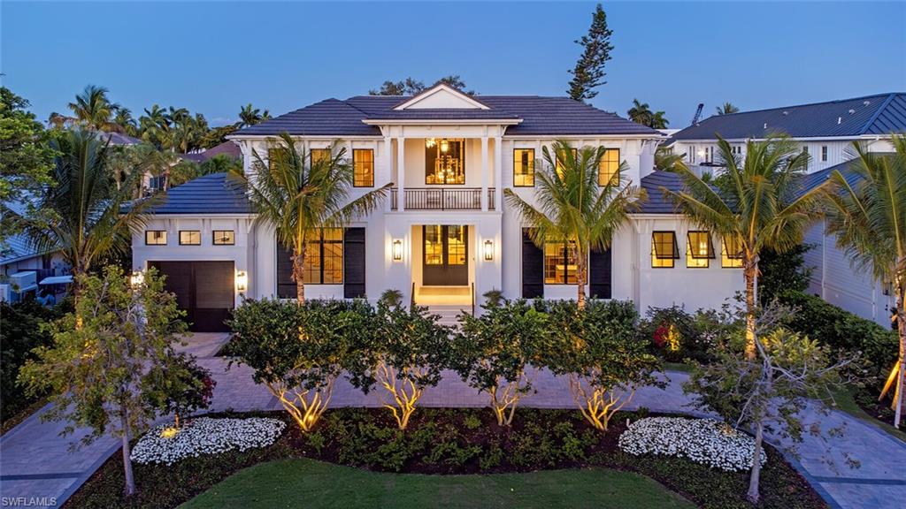 VIV Homes and Kukk Architecture have combined forces to create a timeless Coastal Transitional home situated on an oversized 100 X 185 parcel within easy walking distance to historic 3rd Street amenities and Naples pristine white sand beaches.  Residence includes 5 bedrooms + study, 5 full and 2 half baths, 4 car garage, and offers over 7,300 square feet of air conditioned living space. This magnificent residence includes full concrete construction, bespoke finishes, natural gas supply, and is absolutely beyond compare. Some of the interior finishes include Legno Bastone Lancaster wide plank wood flooring, Poliform Italian made closets, beautiful natural stones, fireplace, gourmet kitchen, service kitchen, 2 laundries, elevator, Lutron HomeWorks system for lighting and shade control, security with cameras, automated roll down privacy shades, Sonos sound, air conditioned garages, and much more. The immense outdoor living area includes a 55’ pool, swim up bar, fire place, built in fire pit area and an oversized outdoor kitchen with island protected by automated roll down screens and shutters. Completion expected March 2024.