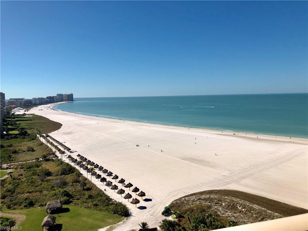 NO COMPARISON within the Gulfview building AND A PET IS WELCOME !!  Spectacular totally remodeled, redesigned, and TURNKEY FURNISHED unit with a million dollar +++ unobstructed southern view of Marco's Crescent Beach! Flowing granite enhances the curved raised bar with concealed LED ribbon lighting which also illuminates both bathroom vanities. A unique dining area has been created with a beautiful custom kitchen and expansion with breathtaking views of the Gulf and beach from the kitchen area. Other amenities include enlarged doorways with solid core doors, crown molding throughout and hurricane windows and sliding glass doors. Beautifully appointed with all new furnishings, accessories and window treatments, stainless steel appliances, granite, plumbing fixtures and beautifully remodeled bathrooms. This unit has just been TOTALLY remodeled in 2018, including a new AC system. Breathtaking view of the ambiance of the Gulf of Mexico and Marco's crescent beach . . . views.  Owner is the Owner and agent.