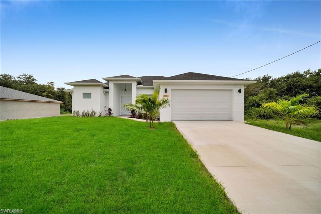 Gorgeous 3 Bedroom plus den/office in a well-established neighborhood in Lehigh Acres. Great location and close proximity to all major shopping, schools and attractions. Top quality and design home with plenty of upgrades. Hight interior ceiling with 9'4" in bedrooms, 11'0" in living room area and 12'0" tray ceiling. Porcelain tile throughout the house and exterior tile Anti slip in porch and lanai. The kitchen countertop is quartz sparkling white. Modern cabinets shaker style with 36" high on the top and soft close doors. Wood closet interior design in master bedroom closets. Beautiful top brand stainless-steel appliances. Washer & Dryer included. The house has HURRICANE IMPACT WINDOWS AND SLIDING DOOR. Large 72-inch ceiling fan in living room area and LED lighting throughout. Ceiling fans in all rooms including the lanai. DON'T MISS THIS OPPORTUNITY TO RENT THIS BEUTIFUL HOME!