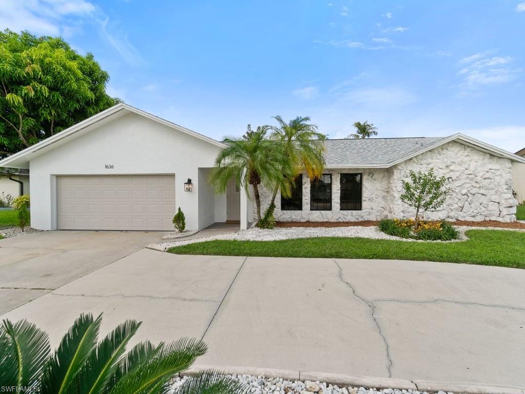 Welcome to your dream home in the sought-after Whiskey Creek community! This stunning 3-bedroom, 2-bathroom house offers a blend of modern elegance and comfortable living. Upon arrival, you'll appreciate the convenience of a circle driveway leading to a spacious 2-car garage. Step inside to discover a beautifully updated interior featuring luxury vinyl plank flooring throughout the living areas and pristine tile in the bathrooms. The heart of the home is the exquisite kitchen, complete with white shaker cabinets, a waterfall quartz countertop island, and new stainless-steel appliances. The open-plan design flows seamlessly into both the family and living rooms, each with sliding pocket doors that open to a screened-in lanai and sparkling pool—perfect for entertaining or relaxing. The primary bedroom is a true retreat, boasting a walk-in closet, dual sinks, and a walk-in shower. Guest bedrooms are thoughtfully located off the family room, providing privacy and convenience. The guest bathroom is equally impressive, featuring dual sinks and a combined tub and shower with a beautiful tile surround. Whiskey Creek is a deed-restricted community with a voluntary membership fee of just $125. Enjoy walking distance to the Whiskey Creek Country Club, ideal for golfers or those looking to dine at its fantastic restaurant. Located just 7 miles from downtown Fort Myers and 10 miles from Fort Myers Beach, this home offers the perfect blend of tranquility and accessibility. Don’t miss the opportunity to make this exquisite house your new home.