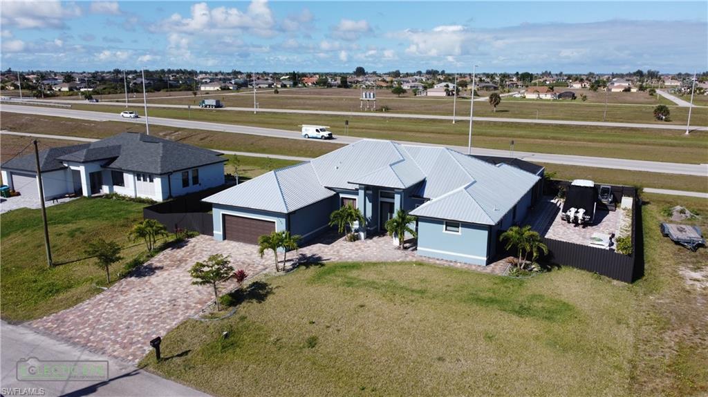 STUNNING NEW CONSTRUCTION WITHOUT THE WAIT!!! This POOL HOME with 4 bedrooms, 3 baths, and 2 car garage, boasts over 2400 sq ft of living area with attention to every detail and amazing upgrades! You will find EVERYTHING in this one!...located in a desirable NW Cape Coral neighborhood near Coral Oaks Golf Course. Schedule a showing today!!!!...Don't forget to check out the Matterport Virtual Tour of this GREAT home!