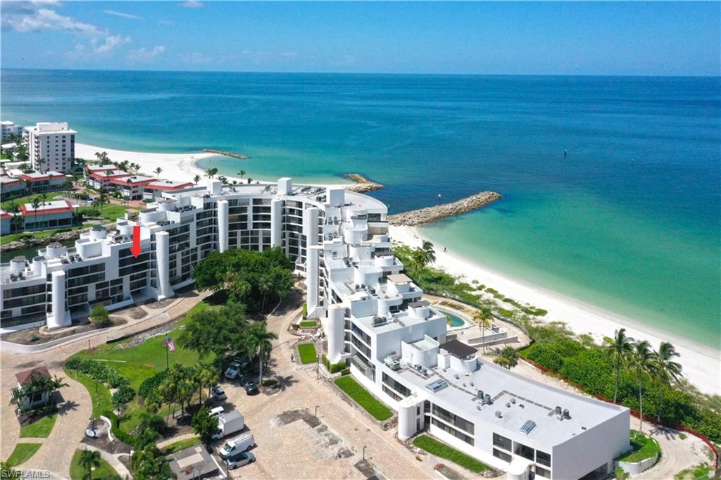This 4th floor 2 bedroom + den, 2 .5 bath Furnished condo overlooking Doctor’s Pass had been completely renovated with open floor plan, new kitchen and stainless appliances, new flooring, new bathrooms, new standard  washer & dryer, new HVAC A/C, and new windows & lanai sliders. Prime location on 10-acres of beach & bay front property with boat slips onsite, it has direct access to the Gulf with no bridges! Unrivaled amenities include 2 clubhouses, fitness facility, 2 Har-Tru tennis courts, shuffleboard and bocce ball court, kayak launch, vehicle wash station. There is a beach-front sunset pool and spa and a bay-side pool and spa plus a kiddie pool.
Under-building parking, 24-hour guard gate, patrolled grounds, secure lobby entry, and friendly staff offer peace of mind.