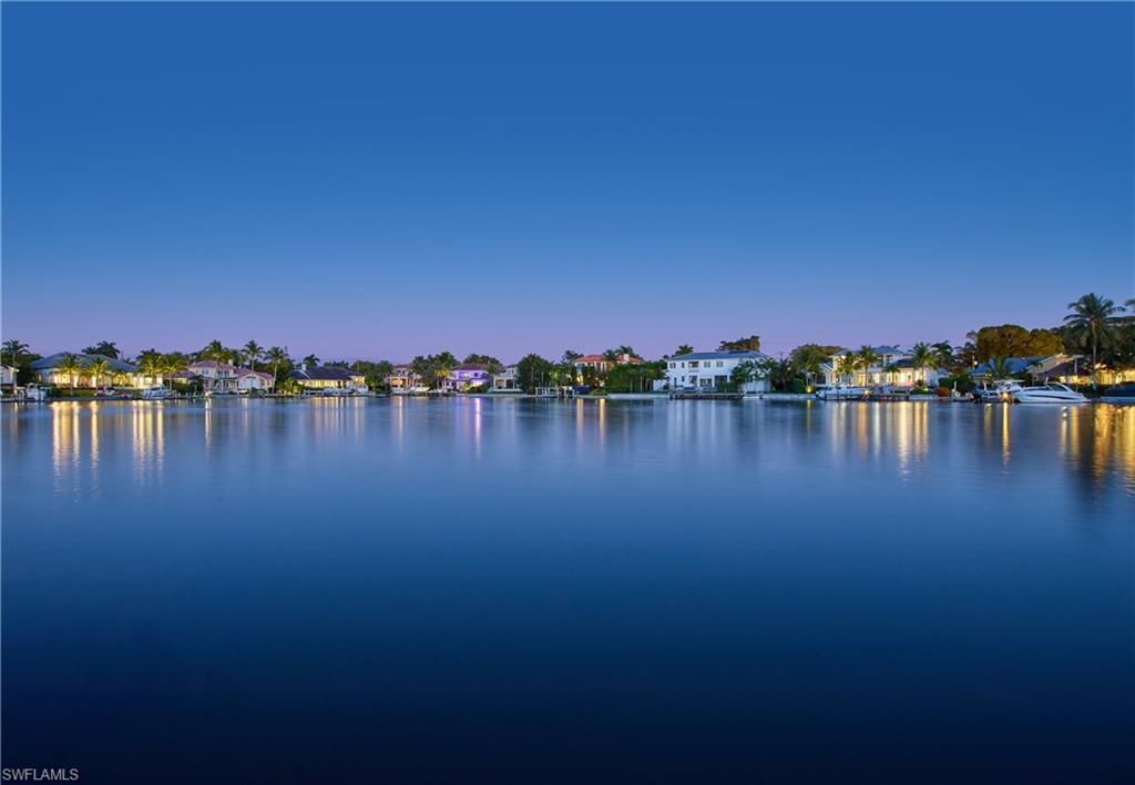 Ideally located on a quiet cul-de-sac and offering expansive eastern views of Hurricane Harbor, this future homesite presents a rare opportunity to build your Naples dream house.  With a deep buildable area and serene bay views, it’s easy to imagine the possibilities for a waterfront home complete with spectacular outdoor living.  The lot contains lush plantings including avocado and citrus trees; a mature ten-foot ficus hedge on the street side creates privacy with a tropical feel.  Situated in the highly sought-after south end of the Moorings, this is one of the few homes on Hurricane Harbor with Moorings Beach Club eligibility, providing an unsurpassed opportunity to enjoy the quiet beach club.  With quick access to the gourmet dining and shopping of 5th Ave S and its neighboring Old Naples streets, this exceptional opportunity to build in one of Naples most exclusive neighborhoods will not last long.