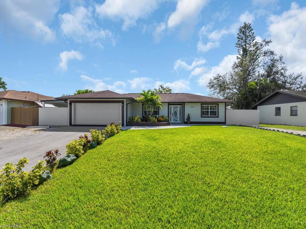RARE FIND - single-family and could also be an an awesome investment opportunity, house has history of over $5,000 monthly rent income. Almost 2,000 sf under air and being tastefully updated, with granite countertops, ceramic wall tile with decorative inserts, and ceramic tile floor all throughout, this diverse property gives you an variety of rental options like airbnb, & more. Not only will you love the comfortable open concept layout, updated kitchen, &  & spit bedroom floor plan, you will fall in love w/ the outdoor living space which includes a screened lanai w/ summer kitchen, spa, fenced-in backyard, open lanai w/ pavers, gardening beds, outdoor garden sink, & enough room for a pool if desired. The septic is only 3 years old and the a/c  units (2 mini splits) are just a few years old. Fantastic Naples location - close to shopping/dining options, walking distance to elementary school, short drive to public boat ramp & golf course, plus less than a half an hour from the beaches that line the Gulf of Mexico.