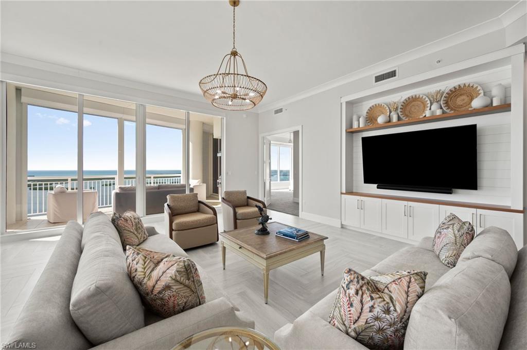 A Seaglass penthouse offering unobstructed Gulf and Bay views and 4,590 sq ft of refined, sky-level living. This residence features 4 bedrooms, 5 baths, a media room, two gathering rooms, and one of the few private 2.5-car enclosed garages in the building.

Move-in ready and available for immediate occupancy, the new pricing reflects the seller’s readiness to move forward — creating exceptional value for a true penthouse experience in Bonita Bay. Floor-to-ceiling windows and an open-concept layout frame sweeping horizon views from sunrise to sunset. The chef’s kitchen is equipped with Thermador appliances, gas cooking, double ovens, a wine chiller, and a sleek island designed for effortless entertaining.

Each bedroom offers an en-suite bath and a private, retreat-like ambiance. The expansive balcony with built-in gas grill becomes your front-row seat to the Gulf’s most breathtaking sunsets.

Seaglass residents enjoy a resort-style pool and spa, state-of-the-art fitness center, private beach club, miles of walking and biking trails, and marina access. Optional memberships include five championship golf courses, tennis, pickleball, and a world-class lifestyle center. With no assessments and strong interest in the building, penthouse opportunities in Seaglass remain limited.

This is a rare chance to live the Bonita Bay lifestyle at its highest level.