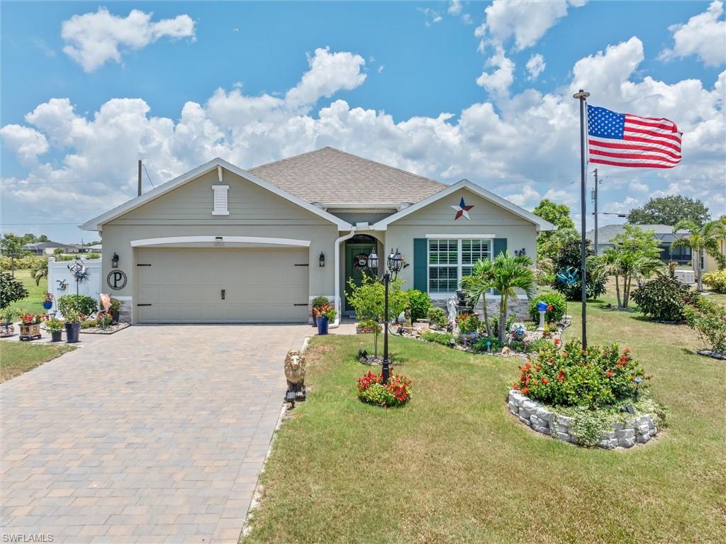 Welcome to effortless Florida living in the sought-after community of Burnt Store Village. Built in 2024and impeccably maintained, this spacious 4-bedroom, 2-bath residence offers the perfect blend of modern design, quality finishes, and room to grow.

Step inside to a bright, open-concept floor plan where elegant crown molding, abundant natural light, and contemporary finishes create an inviting atmosphere from the moment you arrive. The well-appointed kitchen is designed for both everyday living and entertaining, featuring stainless steel appliances, shaker-style cabinetry, a large center island, and generous counter space that keeps everyone connected.

The thoughtfully designed split-bedroom layout provides privacy for family and guests alike. Your primary suite serves as a peaceful retreat with a spacious walk-in closet and a beautifully appointed ensuite featuring dual vanities and a tiled walk-in shower.

The outdoor living space is equally impressive. An extended screened lanai overlooks a fully fenced backyard with plenty of room to create your own private oasis—whether you envision a custom pool, tropical garden, outdoor kitchen, or all three.

Additional upgrades include a water softener system, full-perimeter gutters, and the peace of mind that comes with owning a nearly new home.

Burnt Store Village offers walking trails, a community park, picnic areas, and a scenic lakefront gazebo, all just minutes from Burnt Store Marina, championship golf, waterfront dining, shopping, Punta Gorda, and Cape Coral.

This is more than just a beautiful home—it's a move-in-ready opportunity to enjoy the Florida lifestyle you've been waiting for. Schedule your private showing today and experience everything this exceptional property has to offer.