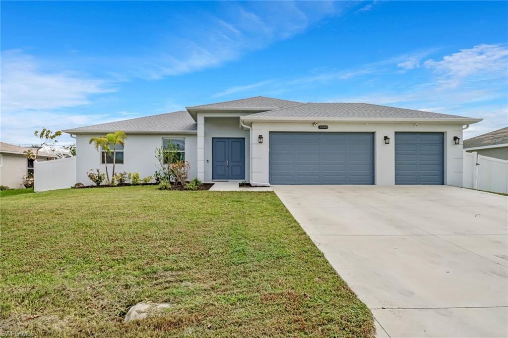 With NO HOA fees, rules, or restrictions- you’ll love this charming home in Cape Coral! Built in 2020, this 3 bedroom, 2 bathroom home features an open floor plan, attached 3 car garage, oversized driveway, hurricane impact glass windows/doors and tile plank flooring (NO carpet throughout)! The living area boasts high vaulted ceilings and is open to the kitchen featuring granite countertops, 36” white shaker cabinets with upper crown molding, a suite of stainless steel appliances and ample counter/storage space. The dining area is right off the kitchen/living area and provides direct lanai access through pocket sliding doors! The generously sized owner’s suite features ample natural light and a private ensuite complete with a tiled shower and dual sinks. Two more bedrooms and another full bath complete this beautiful home. The spacious, paver lanai gives you sparkling pool views and offers a space to host gatherings or simply relax and enjoy the Florida sunshine. The backyard is completely fenced in and provides your own private oasis!