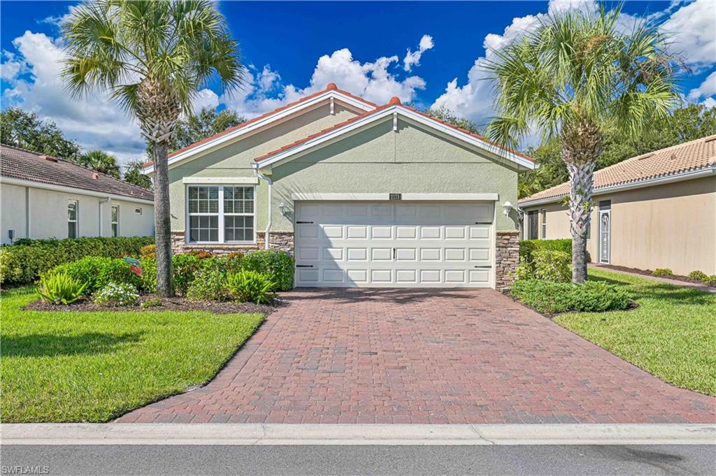 Welcome to your dream home in the heart of a fabulous 55+ community! This stunning single-family home boasts 2 bedrooms plus a Den, 2 bathrooms, and a 2-car garage, providing ample space for comfortable living. The interior features granite counters, stainless steel appliances, carpet, and tile flooring, creating a modern and luxurious atmosphere. The spacious office is perfect for those who work from home or need a quiet space to focus. Step outside to the screened-in lanai and enjoy the beautiful views of the lush landscaping. The kitchen is a chef's delight with beautiful granite countertops, a gorgeous backsplash, and plenty of storage space.  With low HOA fees, you can enjoy all the amenities this community has to offer, including a resort-style pool and clubhouse, Fitness Center, and sports courts.  All of your lawn care needs are included along with Cable and Internet. Don't miss out on this incredible opportunity to live in a beautiful home in a vibrant and welcoming community. Schedule your showing today and make this house your forever home!
