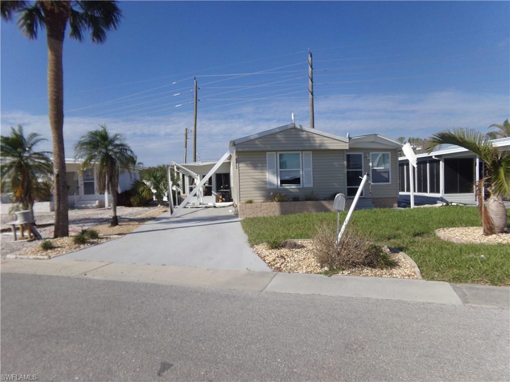 This 2 bedroom/2 bath home was absolutely adorable before it was damaged by Hurricane Ian.  The home has not been remediated, and has been priced just under the land value. Beginning January 1, 2023, buyers pay a $2,400 capital contribution fee.