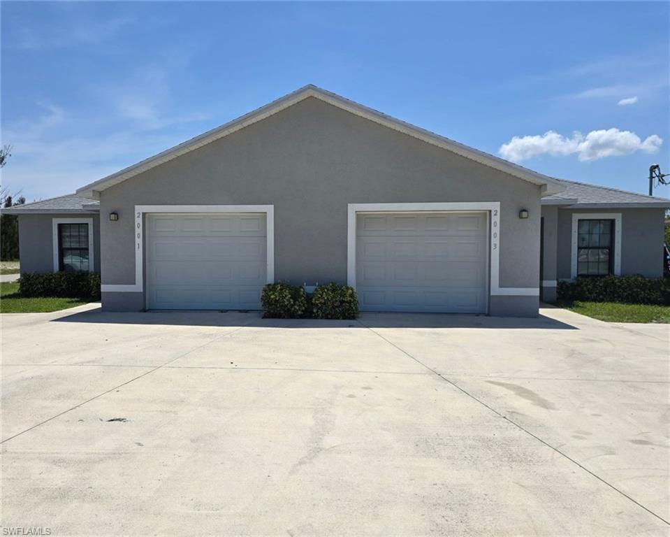 Discover this updated 3-bedroom, 2-bath duplex in SW Cape Coral, FL offering tile flooring throughout and fresh paint for a move-in ready feel.

The property includes a fenced yard with lawn care and pest control provided, plus ample parking.

Upgrades are evident throughout the home, and a washer and dryer are conveniently located in the garage.

Comfortable, well-maintained, and practical—this residence combines low-maintenance features with thoughtful updates.

600+ credit score
First and Security to move in
up to 2 small pets with approval and additional pet fee