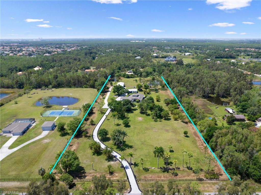 Embrace the Southwest Florida lifestyle with this fantastic gated residence, nestled on 7 serene private acres. Without the constraints of HOA fees, this property offers the ideal balance of peaceful country living and the convenience of all the nearby amenities that Fort Myers has to offer. Spanning over 3,600 square feet, the main residence is a sanctuary of elegance and comfort, featuring three/four bedrooms plus a den. You will love the gourmet kitchen, which is outfitted with a large island, and Monogram appliances. You will experience great detail and quality in this home including wood-embedded tray ceilings, custom doors, a full house generator, Advanced RO system, and an expansive wine cellar and much more! A separate guest residence has been transformed into a fun/retreat space and a separate mother-in-law suite, adding a unique touch to this remarkable estate. The property is a haven for storage and recreational activities, boasting a spacious pole barn ideal for housing your boat, your RV, or perhaps your own personal gym! Complemented by two scenic ponds and an grand iron gate entry that opens to a winding, paved driveway. Generous spaces for entertainment and leisure, including a beautiful pool with custom features to an inviting outdoor fire pit area. Offering unmatched privacy, luxury, and flexibility, this estate goes beyond being merely a home—it embodies a lifestyle. Immerse yourself in the allure of Southwest Florida with this exquisite property, where space, elegance, and endless possibilities await!