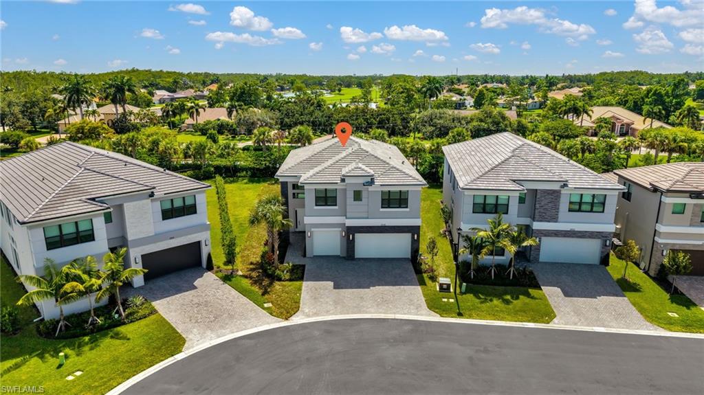 LUXURY FEATURES THROUGHOUT in this gated Rivercreek community! Brand New custom pool & spa (just finished in July 2026) on extended/widened lanai, travertine flooring, water/fire bowls, frameless cage & surrounded by updated landscaping. Situated on an oversized pie-shaped lot and in a Cul-de-Sac road.
This 2-story GL Olympia model features 4 bedrooms + den, loft, 5 full bathrooms, 3-car garage, 3736 sq ft under air, custom office in flex room w/ frameless glass French doors + custom built-in, custom closets throughout, quartz countertops throughout, gourmet kitchen w/ GE appliances, impact glass windows & doors, tile & wood flooring throughout, high-end light fixtures & fans, plantation shutters throughout, and designer grade cabinetry. SEE ATTACHED FEATURE SHEET to MLS supplements. RiverCreek, a natural gas community, offers an abundance of amenities for the entire family to enjoy. With a sprawling 12,000 sq ft clubhouse featuring an indoor sports complex, a resort-style pool, a fitness center/exercise studio, an event room, a catering kitchen, a card salon, a sports lounge, a fire pit, a playground, a splash park, indoor & outdoor basketball, and lighted courts for pickleball, tennis, and bocce. There's something for everyone across the community. Located off the Corkscrew Road corridor just east of I-75, giving you easy access to FGCU, Coconut Point, Hertz Arena, Gulf Coast Top Golf, Town Center, & Miromar Outlets. Plus, you will be just a short drive to championship golf courses, community parks, and the beaches that line the shore of the Gulf Coast.
