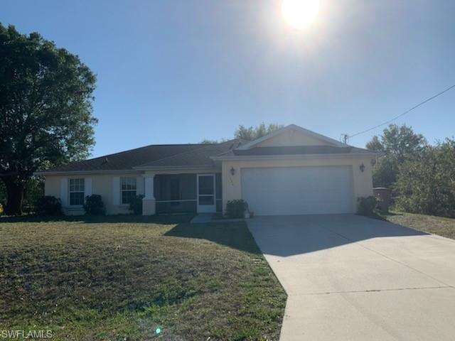 Freshly Painted In and Out - New Carpet - Quiet Neighborhood - Spacious and Open Floor Plan - Covered Lanai - Split Plan - Ready to Move-In and Priced to Sell - Call Today for Showing.
