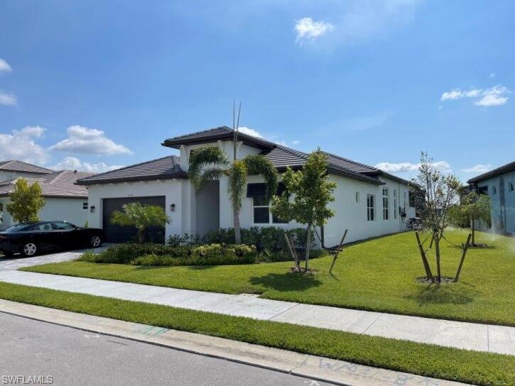 ANNUAL UNFURNISHED STARTING AUGUST 2026! Large family home, in a pet friendly community. Here are some outstanding features that this home has: private pool and spa with sun-shelf and water feature boasting lake views with panoramic screening, pool bathroom, and outdoor kitchen makes it perfect for entertaining. Large living room with a built-in fireplace.  King-size bedrooms with ample closet space.  Kitchen was professionally designed with elite cabinets and appliances.  Bathrooms have walk-in showers, master suite has a large tub, his and her vanities. Included are the ample amenities in this gated community. Located minutes to stores, restaurants, entertainment, and close to Marco Island and Naples beaches.