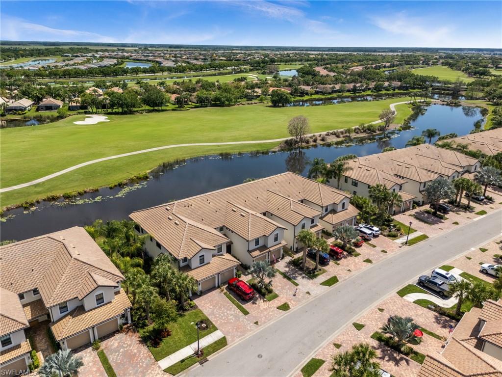 Welcome to the Del Webb lifestyle—where resort-style living meets everyday ease in a vibrant 55 & better community designed for connection, wellness, and enjoyment. Here, days can be as active or as relaxed as you choose, with a full suite of amenities including a state-of-the-art fitness center, resort-style pool and spa, tennis and pickleball courts, bocce, scenic walking paths, and a dynamic calendar of clubs, classes, and social events that bring neighbors together. Built in 2023 and offered mostly furnished, this beautifully appointed condo delivers effortless, maintenance-free living with a refined, move-in ready appeal. Thoughtfully designed for both comfort and style, the residence features impact-resistant glass throughout and striking zero-corner sliding glass doors that completely open the living space to the outdoors—creating a seamless indoor-outdoor experience that defines Southwest Florida living. A screened lanai and charming front porch offer multiple spaces to unwind or entertain, while inside, the home is elevated by high-end upgrades including blackout electric shades, plantation shutters, designer lighting, ceiling fans, fresh interior paint, and added electrical outlets for modern convenience. A radon mitigation system installed in 2025 provides an additional layer of peace of mind. With no stairs, the layout offers easy, single-level living—ideal for both comfort and accessibility. Just steps away, residents enjoy exclusive access to a private “condos-only” pool and hot tub, offering a quieter, more intimate retreat within the community. Perfectly positioned within walking distance to scenic South Park, as well as nearby dining and local favorites, this residence captures the essence of the Del Webb lifestyle—low-maintenance living, thoughtfully elevated, and centered around community, convenience, and connection.
