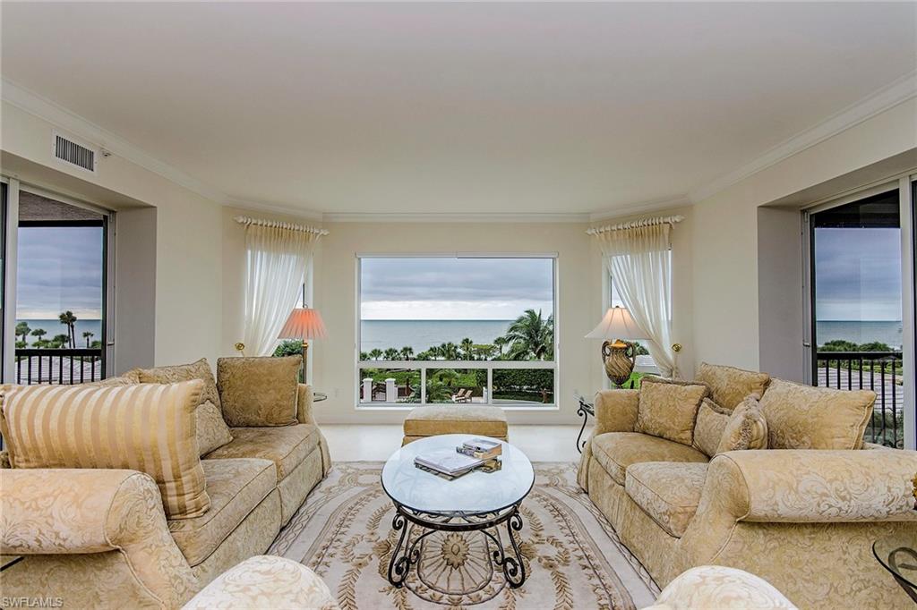 Enjoy the cozy beach house feeling and year-round sunsets from this lovely third-floor residence in the highly sought-after, completely remodeled Biltmore at Bay Colony. Situated directly on the beach, this beautiful residence features 3,200 square feet of gracious living, three bedrooms plus den/family room, three full and one-half baths, three generous lanais, a large gourmet kitchen and luxurious master bedroom and bath. Biltmore amenities include a heated pool and spa, sun deck, BBQ grills, state-of-the-art fitness center, saunas, billiards, 24-hour front desk service, two guest suites and a social room. Bay Colony homeowners and members are just steps away from the exquisite Bay Colony Beach Club that provides casual and elegant dining, pool and beach attendants. Homeowners also have exclusive access to the private entrance of the world-renowned Ritz-Carlton resort and spa.