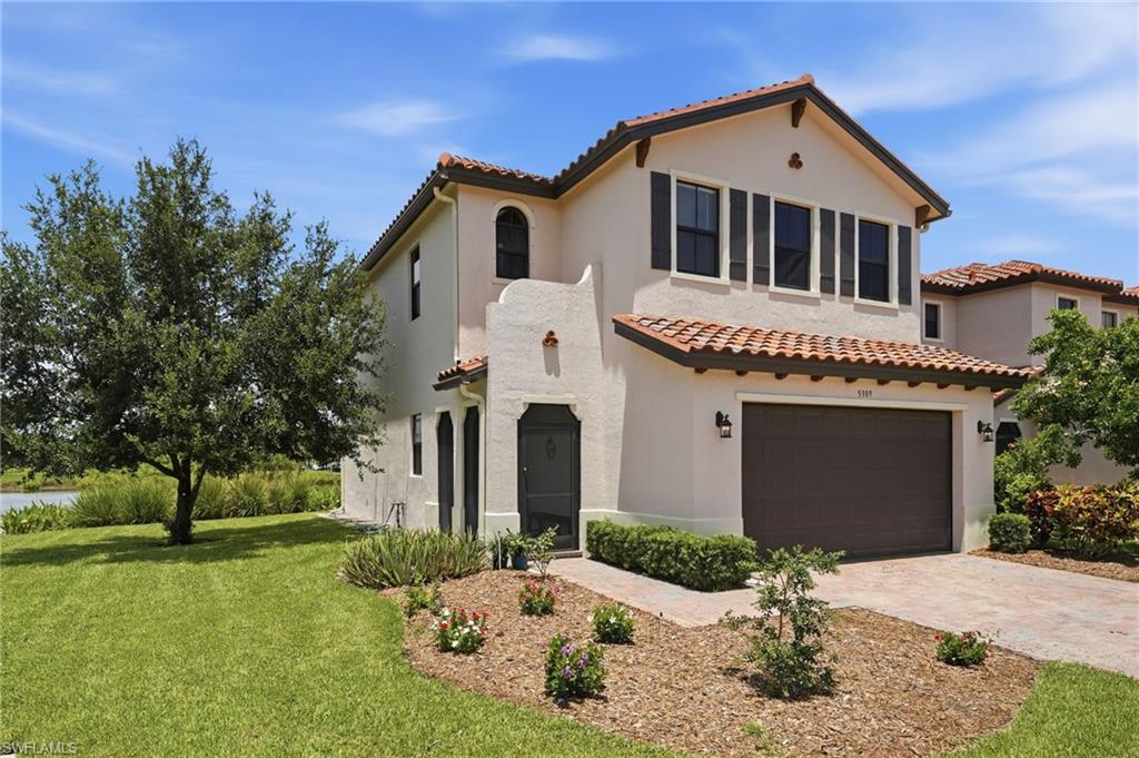 One or more photo(s) has been virtually staged, AI generated or rendered.  Why wait months for new construction when you can move right into this well-maintained, move-in ready lakefront home in the desirable Coquina at Maple Ridge community of Ave Maria. This 3 bedroom, 2.5 bathroom home offers peaceful lake and sunset views with no homes across the water, just open greenery for added privacy. As an end-unit property, it provides additional space, privacy, and convenient access to main roads.
Inside, the home features fresh interior paint, soft gray flooring throughout, new ceiling fans, and window coverings in every room. The open layout is designed for comfortable everyday living. The spacious two-car garage includes epoxy flooring, overhead storage, and an additional refrigerator, offering both function and convenience. Located within walking distance to shops, restaurants, a gas station, car wash, and more, this home combines convenience with lifestyle. Residents enjoy access to Maple Ridge amenities including a resort-style clubhouse, pool, fitness center, parks, and community spaces. Additional Ave Maria amenities include walking and biking paths, sports parks, playgrounds, dog parks, shopping, dining, and a vibrant town center. One or more photo(s) has been virtually staged, AI generated or rendered.