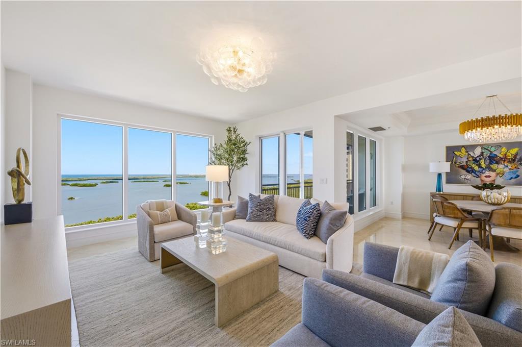 A special opportunity in Esperia at Bonita Bay:  A higher floor unit—17th floor—with the very desirable "02" floor plan.  Offered furnished.  This home has panoramic views from the main living areas looking West to the Estero Bay and the Gulf of Mexico beyond.  Looking East, the expansive views feature Bonita Bay’s championship golf courses, pristine lakes and acres of beautifully-manicured green landscape and undisturbed nature.  This residence contains 3 Bedrooms/3 Full Baths and 2,730 total square feet under air, with high-end designer furnishings and many upgrades.  Newly remodeled with high-end lighting throughout.  New hardwood floors in the informal living space.  Completely-remodeled kitchen with quartz countertops with Thermador premium appliances: integrated 42” refrigerator with freezer drawers, 36” induction range, dishwasher and wine cooler.  Sharp under-counter microwave.  Samsung front-load washer & dryer.  A SPECIAL ADDED BONUS: YOUR OWN PRIVATE 2-CAR GARAGE (close to the elevator lobby) INCLUDED IN THE SALE.  High-end designer furniture is located throughout the home, which is included in the sale.  Esperia has undergone a beautiful renovation of all first and second-floor lobby areas, along with a completed renovation of the Clubhouse where Esperia residents enjoy a state-of-the-art fitness center, men’s and women’s spas with steam room, card room, billiard room, and club room for social activities.  An added bonus: five (5) well-appointed guest suites are available for daily rental at reasonable rates for visiting family and friends.  Bonita Bay residents also enjoy 12+ miles of walking/biking paths and 3 nature parks, plus tennis, pickleball, kayaking, and canoeing.  Don’t miss a special added bonus: the new, private Bonita Bay Beach Club located directly on the Gulf of Mexico—exclusively for use by Bonita Bay residents and their guests.  The optional Bonita Bay Club membership features world-class golf (5 golf courses, 3 of which are located inside the front gate, with 2 others located East), tennis and pickleball, Clubhouse with gourmet dining and social activities, and a 6,000 sq. ft. Lifestyle Center with complete fitness facilities, and men’s and women’s spa services.  Located in a quiet and peaceful natural setting, but within easy reach of numerous gourmet dining and shopping options, live entertainment in the vibrant Downtown Bonita Springs, and easy proximity to the RSW International Airport.