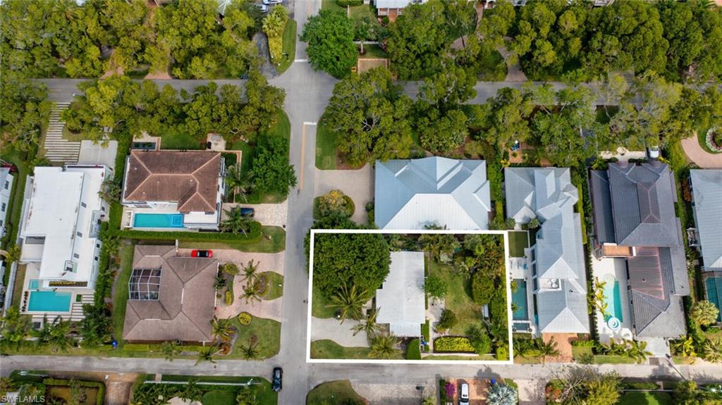 Build your dream home!  Prime building site located on a quiet street in the heart of Olde Naples.  Just three short blocks to the famous Naples beaches and five blocks to Fifth Avenue S. for world class shopping and dining.  No flood water intrusion or other damage occurred from Hurricane Ian.