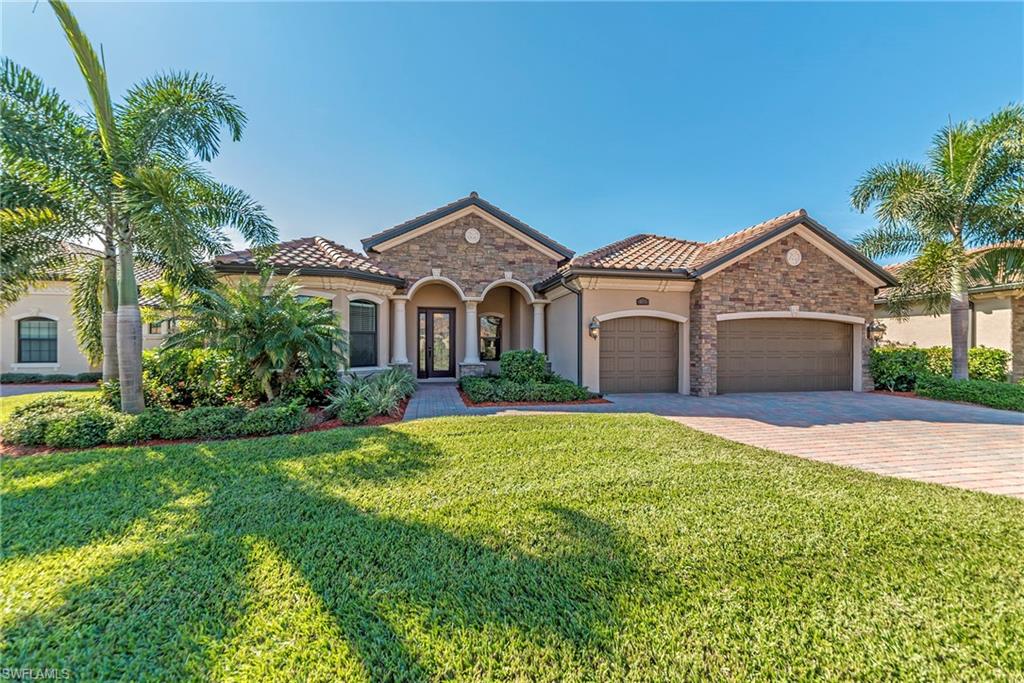 This highly desirable Portofino floor plan is ideal for families or visiting guests. 2 bedrooms are located on a hallway and share a full bath. The guest wing is located by the pool and has direct access to the pool deck as well as it's own bath.The beautiful gourmet kitchen with stainless appliances has an ample pantry and lots of counter space.The breakfast area is flanked by a seamless glass angled window and overlooks the outdoor living area.  The owner's suite is the only bedroom located on the left side of the house for maximum privacy.  Owner suite features 2 clothes closets and a linen closet. Owner's bathroom is anchored by the garden tub and just behind the tub is a large open walk in shower with decorative tile tile band and seamless glass window. Dual sinks and a private commode complete the bath.  The spacious owner's bedroom features a sitting area by the rear window, a great spot for a writing desk, or a comfy chair for that early morning or bedtime book. The outdoor living is second to none with lanai access from 3 sliders, an outdoor kitchen, and a pool and spa with waterfall features. This home is located in a golf community but does not include a golf membership.