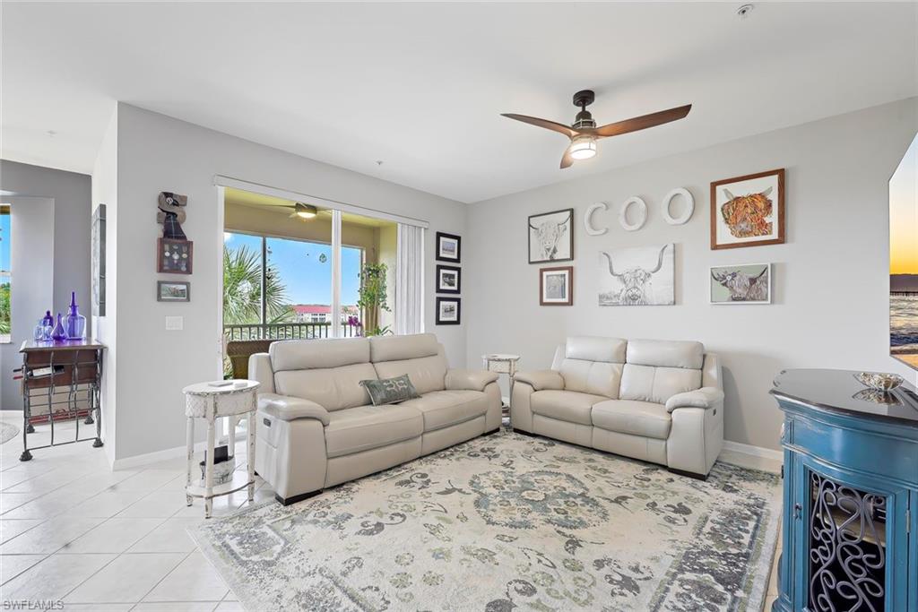 Welcome to this beautifully maintained condo located on the top floor in the sought-after community of Cypress Woods Golf and Country Club, offering a peaceful and serene atmosphere just minutes away from all the excitement Naples has to offer. With 2 bedrooms, 2 bathrooms, and ample living space, this unit is perfect for those seeking comfort and luxury. Upon entering the home, you'll be greeted by a spacious living area that boasts natural light and an open floor plan. The kitchen features new countertops and modern appliances, providing plenty of counter space for preparing meals and entertaining guests. Newer air conditioner, ensuring your comfort year-round. The master bedroom is a true retreat, complete with an ensuite bathroom and walk-in closet. A second bedroom provides a cozy space for guests or a home office. Enjoy your morning on the private screened lanai, which offers a peaceful view of the lush surrounding landscape. This home includes 1 covered carport, storage room on the same level as the unit.  access to the community's world-class amenities, including a pool, fitness center, tennis, Pickleball, golf and clubhouse. Don't miss out on this incredible opportunity to make this gorgeous condo your own!