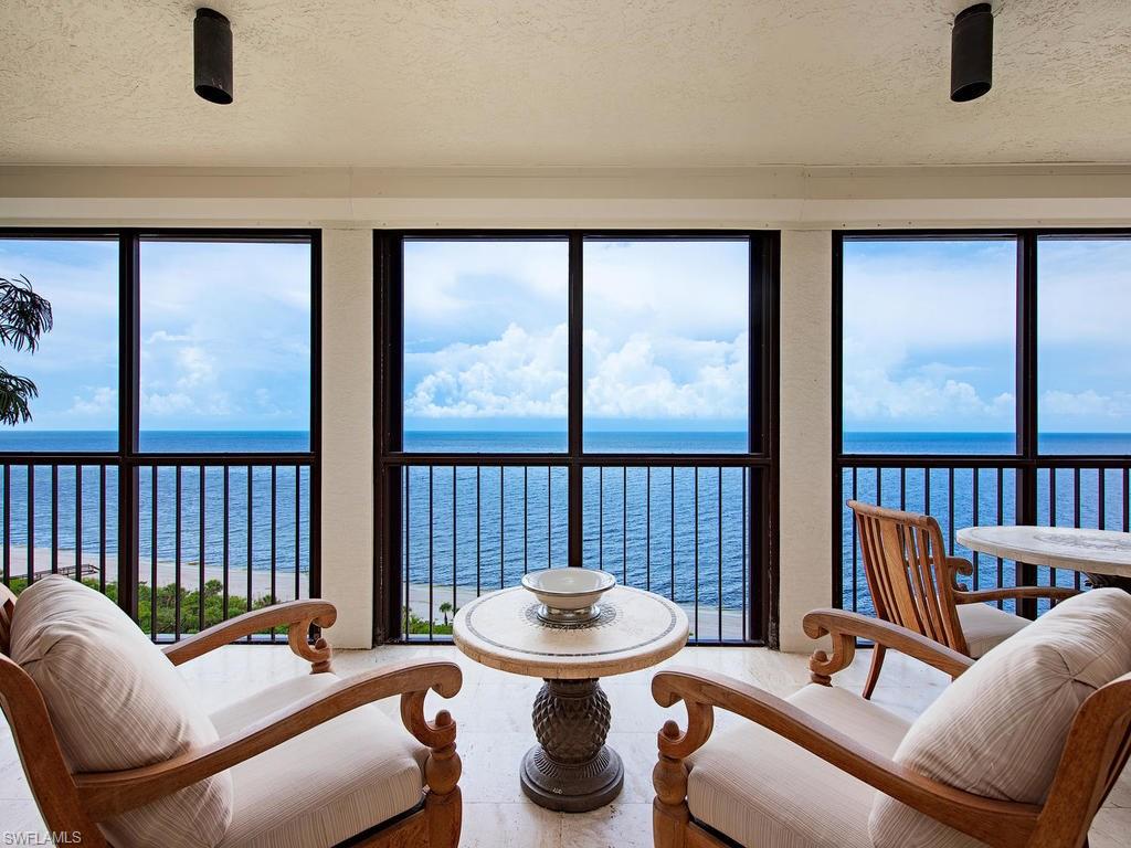 C.15087 - Enjoy stunning and private Sunrise, Sunset, Beach, Sand, and GULF-FRONT VIEWS from the moment you enter this direct beachfront Carlysle Tower JEWEL. This light and cheerful retreat showcases dramatic floor-to-ceiling Easterly sunrise to Westerly Gulf sunset “through-views” from all main living areas, along with 2 spacious screened lanais for pure waterfront Florida living. This property offers hard surface flooring, re-mastered crisp white and stainless chef’s-delight kitchen, new A/C, lighting updates, and 2 under-building parking spaces. Carlysle is a full-service Tower offering 24/7 front desk personnel, beloved on-site professional full-time management and staff, social salon, fitness, and two guest suites. Enjoy the prestige of both Bay Colony and Pelican Bay membership privileges including Signature Concierge Services, 3 private Beachfront Dining Clubs, attended Beachfront Services, Active Tennis Club, plus 2½ miles of pristine sugar white sandy beach, nature walking and bike paths, expansive fitness. Community Lifelong Learning Center, Artis Center for Performing Arts, Mercato, and Waterside Shops just steps away.