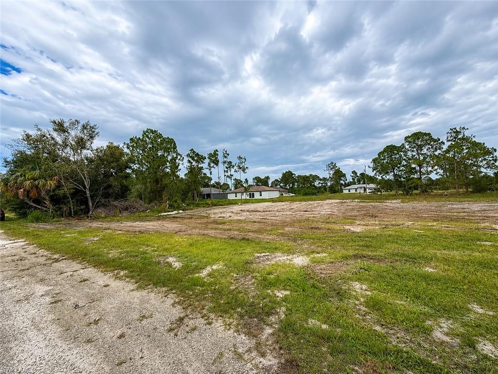 This lot at 845 Dante Ave S, Lehigh Acres, is a prime opportunity and can also be purchased together with the adjacent lot at 843 Dante Ave. Both lots were cleared and filled in combination, with a total of 10 truckloads of soil, making them fully prepared for construction. Whether you plan to build on one or both parcels, this combined preparation sets the stage for your next project.