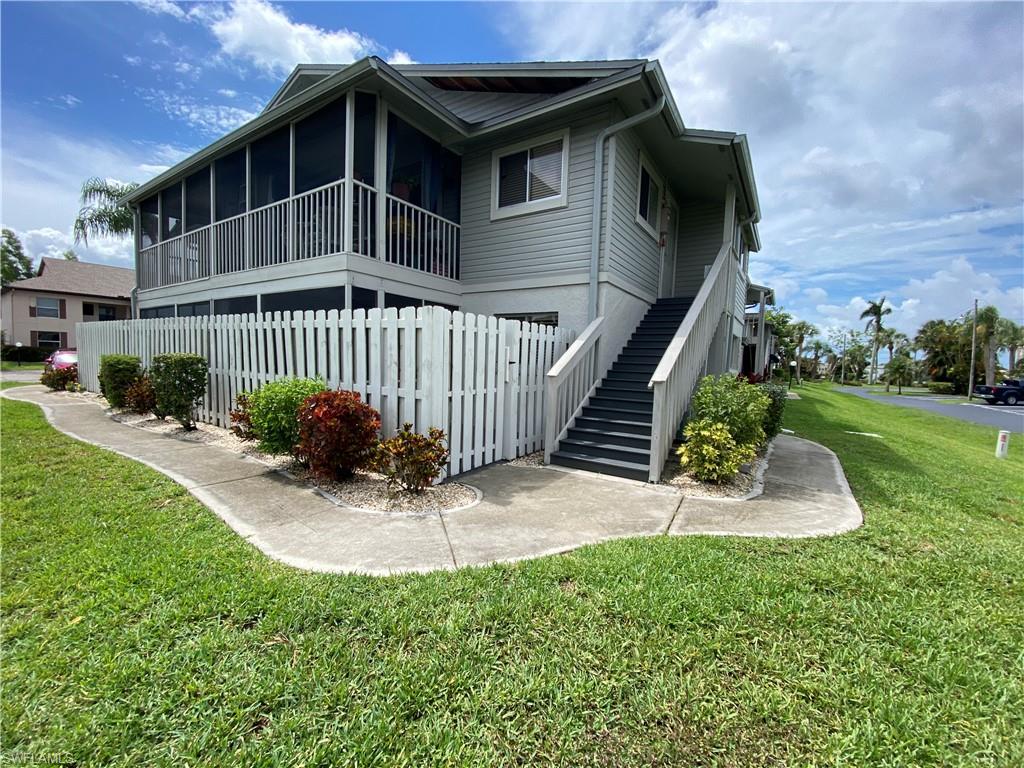 Move-In Ready! Beautifully remodeled first-floor corner unit ready for new owners. Inside is a spacious living and dining area, 2 bedrooms, and 2 baths with a Jack and Jill tub/shower. Outside you have a screened lanai with a large storage closet, roll-down shades,  and a Trex deck all enclosed with a privacy fence. A full-size washer & dryer are located inside the unit for your convenience. Other features include new stainless appliances and kitchen sink, new laminate flooring, fresh paint throughout, quartz counters, a breakfast bar, backsplash in the kitchen, new bathroom vanities, new trim, and interior doors throughout, and ample closet space. Located in Foxmoor. You will fall in love with this pristinely maintained community conveniently located to US 41 & I75. This community has so much to offer including community pools, tennis courts, bocce ball & a dock with Gulf access! Dock space is available for lease.