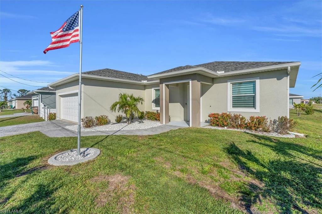 New Discovery, Cape Coral 3/2+Den Single Family Gem! Built in 2020 with impact windows and doors, this diamond was unscathed by the recent hurricane. The ranch style home features a split floorplan giving the new owners all the privacy they need for their master quarters. The master bedroom comes with not one, but two walk in closets and a large bathroom including jacuzzi tub, enclosed shower, and gorgeous granite top double vanity. Enjoy seamless 24x24inch tile throughout the entire home. Its modern design with inviting open concept Kitchen displays a large functional island, equipped with stainless-steel double sink and dish washer connection. All this enhanced by a high vaulted ceiling, wood cabinets, and granite counter tops. The hallway to the two-car garage, creates an ample space which also serves as a dedicated laundry room with additional cabinetry and storage. Other home features include covered lanai, irrigation system and more. Sitting on a double lot, this property is just over 10,000 sqft. Conveniently located 5 minutes from Pine Island Road providing access to Supermarkets, Departments Stores, Restaurants and Pharmacies. 4 minute drive to Burnt Store Boat Ramp.