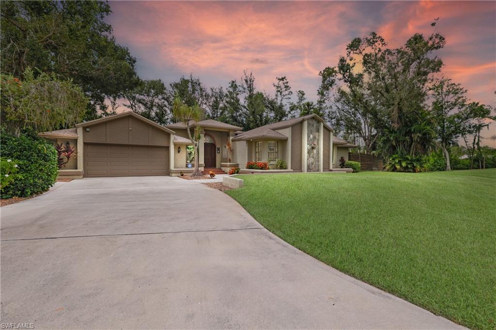 Searching for a truly unique and charming home? Look no further! This hidden gem not only features a backyard that spans nearly the length of a football field but also offers ample shade from the surrounding oak trees. Discover the beauty of this spacious four-bedroom, two-bath house tucked away in the peaceful Rookery on Plantation Road. Step outside and discover two screened patios perfect to add a pool, outdoor kitchen and anything else your heart desires. The timeless architecture, new roof, stainless steel appliances, fireplace, and extravagant master suite add to its charm. The oversized garage provides extra space for storage or a workshop. Enjoy your morning coffee on the private patio with views of the preserve. Located in a sought-after neighborhood with easy access to shopping and dining. Don't miss out on this exquisite home. Relaxed HOA does not have lease limits. Schedule your showings today!