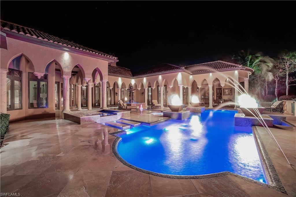 Welcome to The Villa Farnese... This Venetian styled award winning home features some of the most exquisite details in a home one could imagine and is not to be missed. Some of the highlights of this home are a magnificent pool area featuring a courtyard fountain, water features and 4 gas fire bowls that create an unforgettable outdoor ambiance. The lanai living room area with fireplace, TV and outdoor kitchen are perfect for entertaining and capturing the tropical surroundings and beauty of the pristine lake on the 15th fairway. On the interior, you'll find a newly remodeled kitchen by BCB Homes with Viking appliances, private garden for guest suites, stained glass window between kitchen and wine cellar, stone flooring, detailed ceiling treatments and exquisite faux finishes. The current owner has spared no expense bringing this luxury home up to todays high end standards and should be viewed by the most discerning buyer. This Collins & Dupont furnished home can be viewed by contacting the listing agent today, you will not be disappointed. Mediterra Golf & Beach club offers multiple levels of membership. IMMEDIATE GOLF MEMBERSHIP AVAILABLE WITH THE PURCHASE OF THIS HOME!