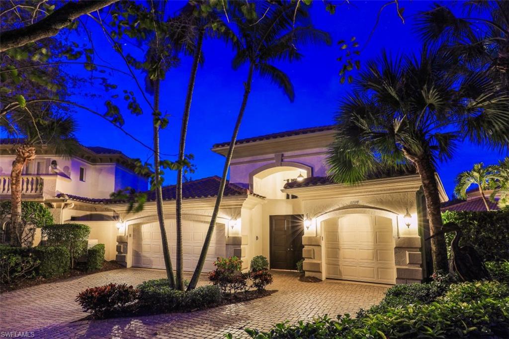 Grand Isle Drive features soaring ceilings and an abundance of windows flooding this courtyard style home with natural light. This former developer model sits on one of the largest sites in a cul-de-sac. Interior features include beautiful white oak hardwood floors in the main home, renovated chef’s kitchen with oversize island with two refrigerator drawers, gas cooktop, two beverage stations with wine fridge and ice maker, custom wood cabinetry, Quartzite countertops, and Sub Zero Refrigerator, Bosch & Thermador, appliance package. The “Great Room” floor plan enhances the beautiful southern exposure views upon the 2,958 sq/ft lanai and pool area which adds natural light through the entire living area. The main house provides over 3,400 sq/ft while the two story 1,446 sq/ft guest cabana offers its own living area with two additional bedrooms and bathrooms and sauna. The 1st floor primary suite and study open to another lanai with gorgeous golf course views. The home flows beautifully out to the courtyard with a 40 ft pool and spa with privacy wall, enhanced with lush tropical landscaping. **X FLOOD ZONE, NEW AC'S (3) NEW WATER HEATER (2), RENOVATED KITCHEN AND BATHS.**