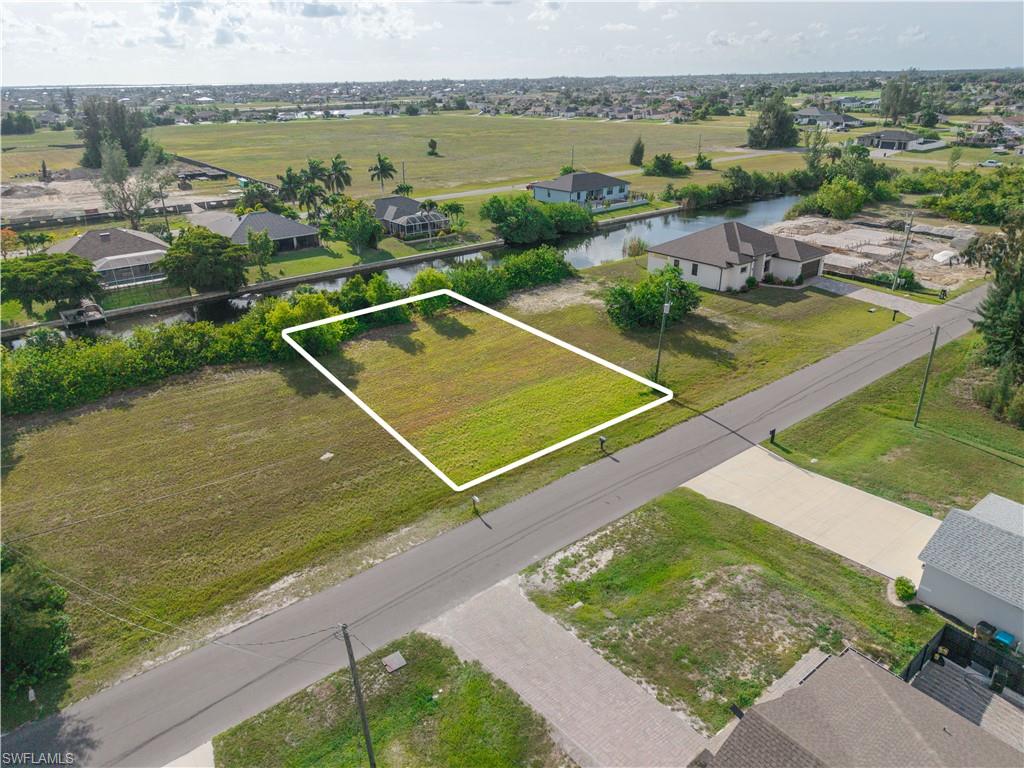 Freshwater canal lot located in the desirable NW Cape Coral area. Enjoy a peaceful waterfront setting in a growing neighborhood with convenient access to shopping, dining, schools, parks, and major roadways. Excellent opportunity to own property in this expanding residential community. Buyers are encouraged to perform their own due diligence regarding zoning, utilities, building requirements, and future use.